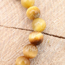 Armband aus Goldenen Tigerauge Perlen I Größe L
