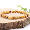 Armband aus Goldenen Tigerauge Perlen I Größe L